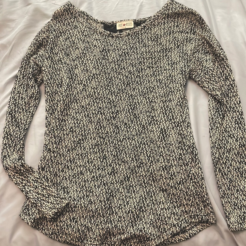 Small, Free Kiss black and white long sleeve, lace in the back.